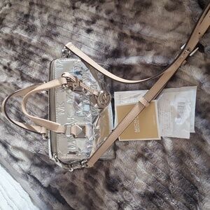 Silver metallic barrel bag